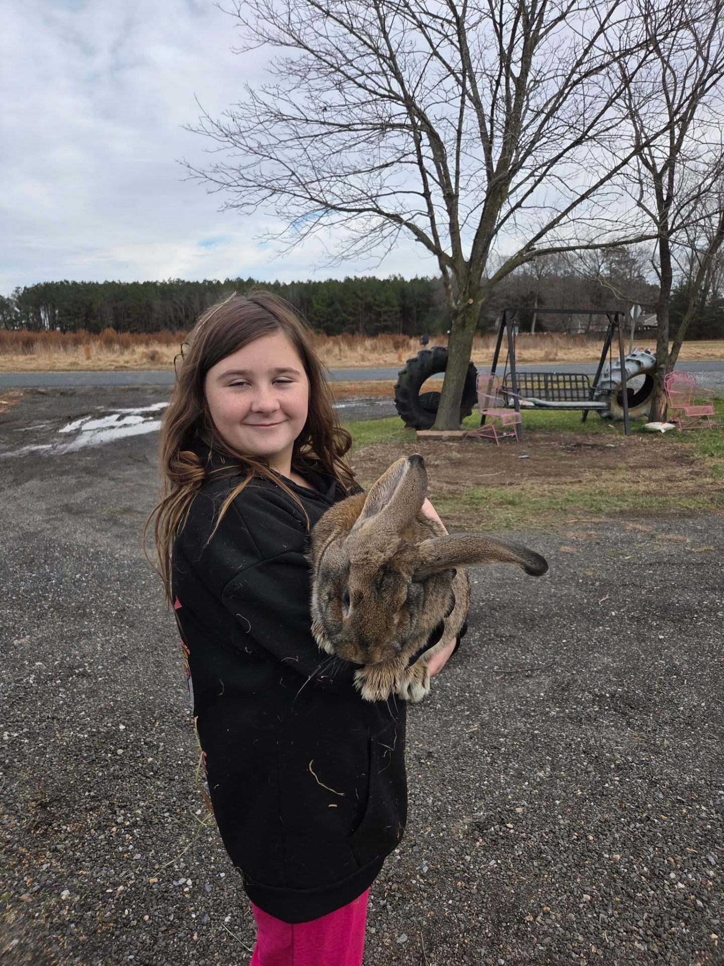Danielle holding a rabbit